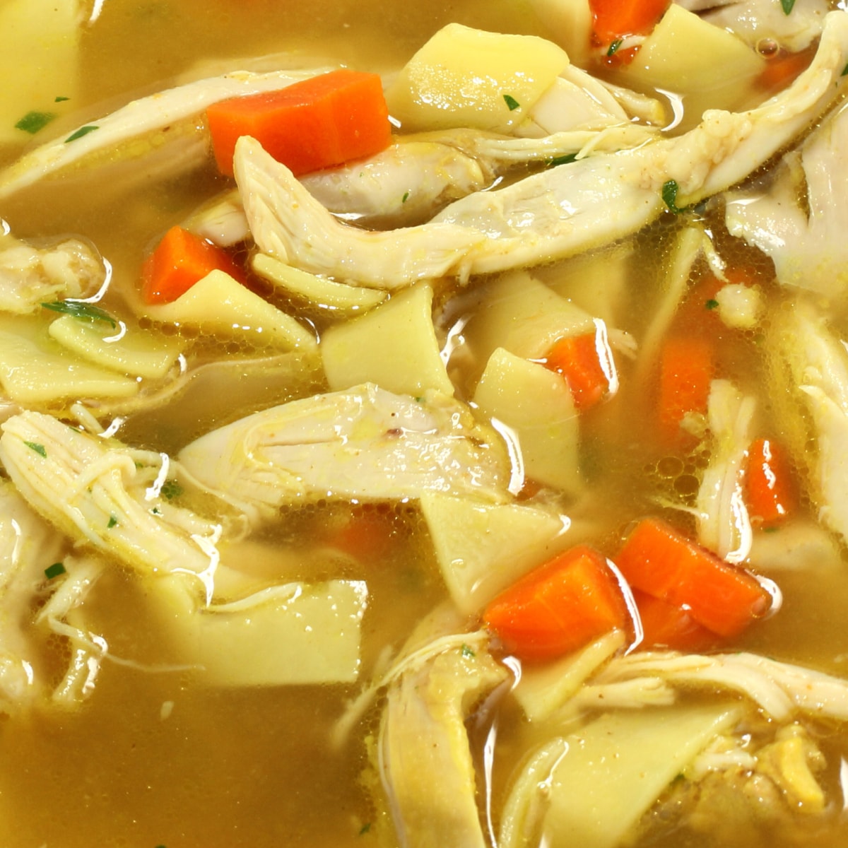 Golden Chicken Noodle Soup with Turmeric and Ginger